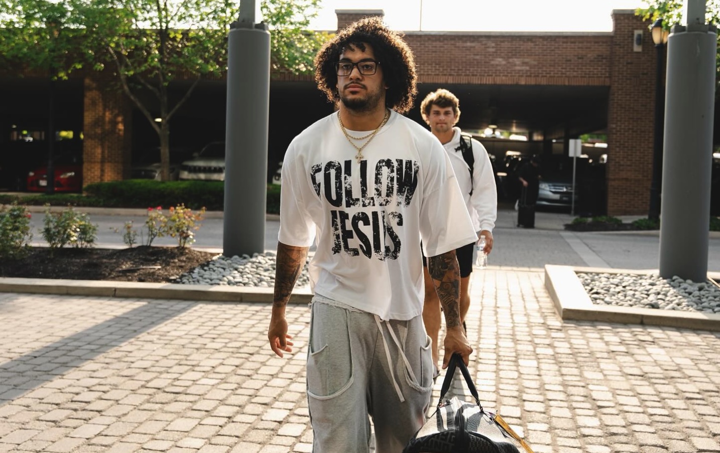 Over 20 Ohio State University football players come to camp wearing Jesus-themed T-shirts